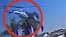 美国加州一直升机从天而降砸断棕榈树，机上两人奇迹生还